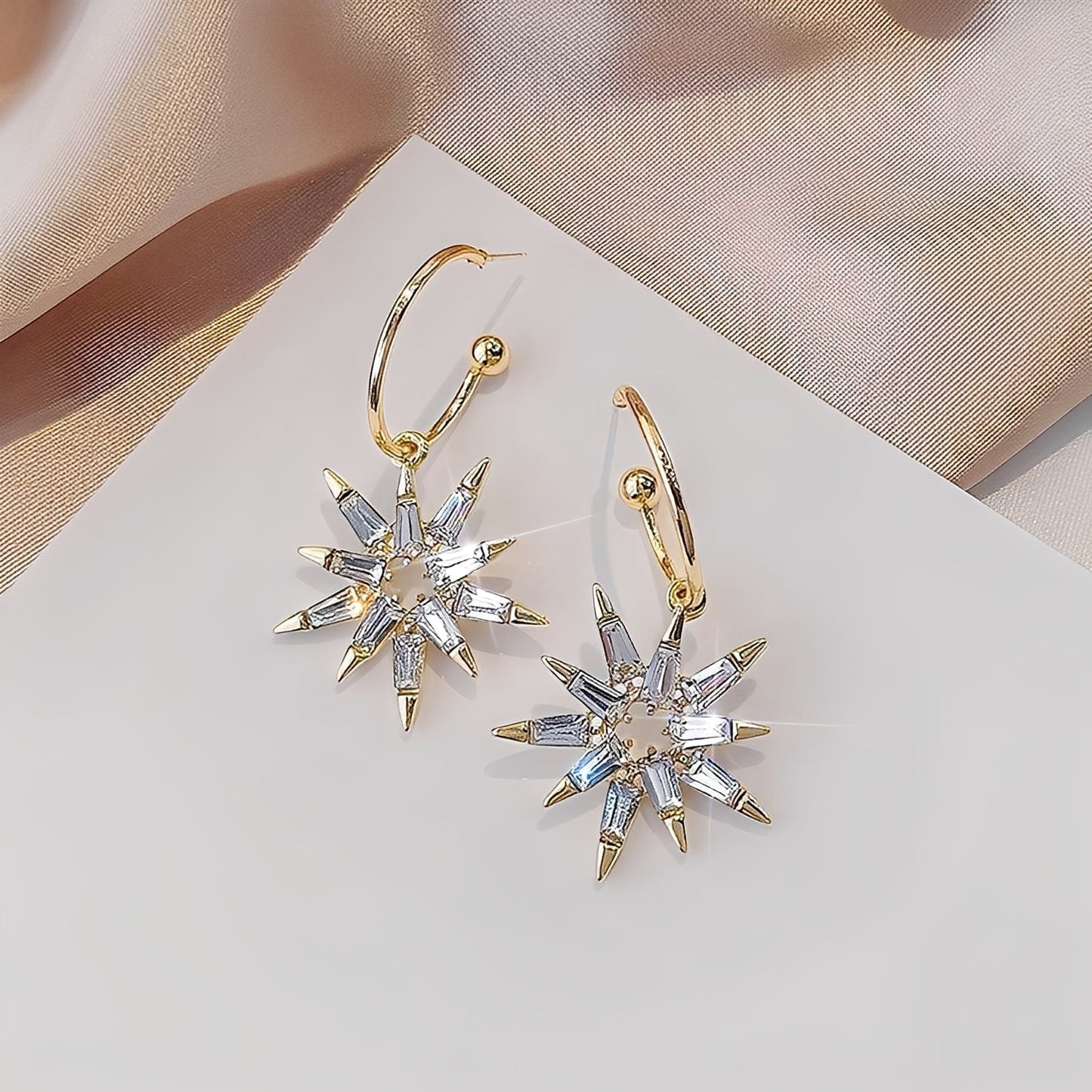 Xienna – Glittering golden star earrings