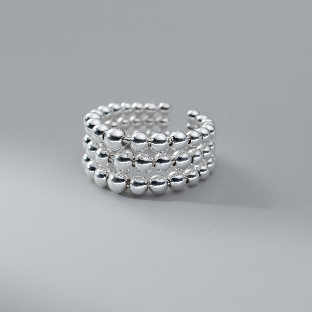 Women’s Wide Ring with Layered Pearl Details and Polished Surface