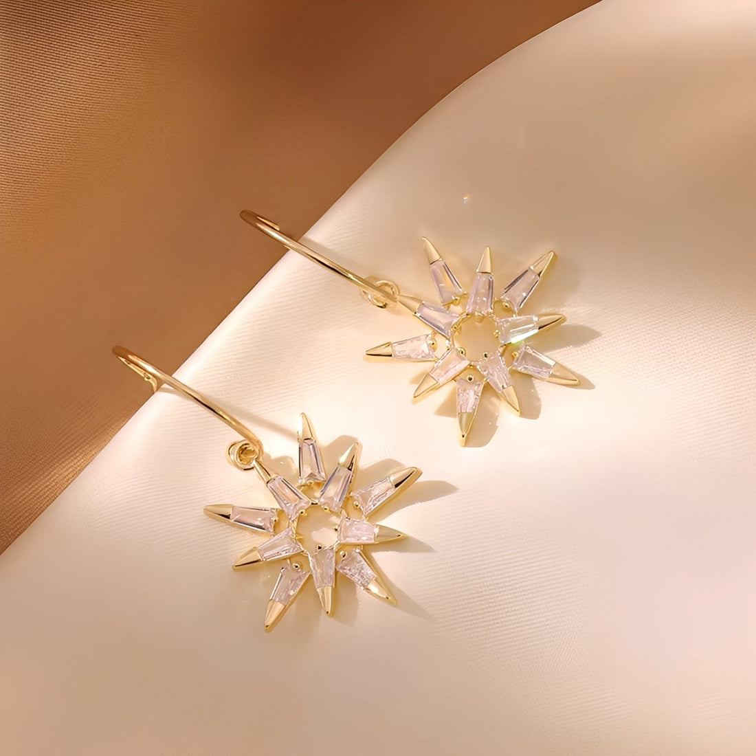 Xienna – Glittering golden star earrings