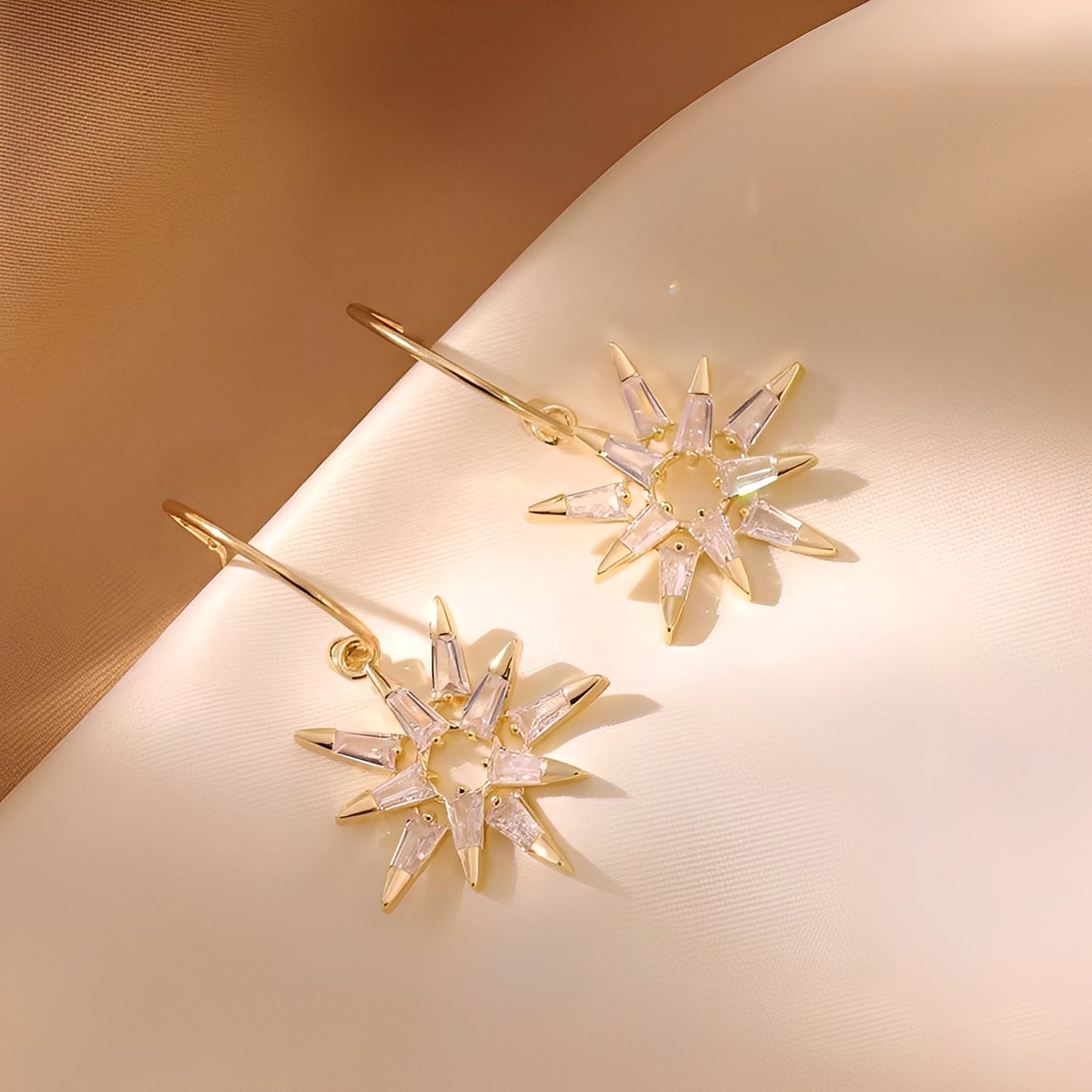 Xienna – Glittering golden star earrings