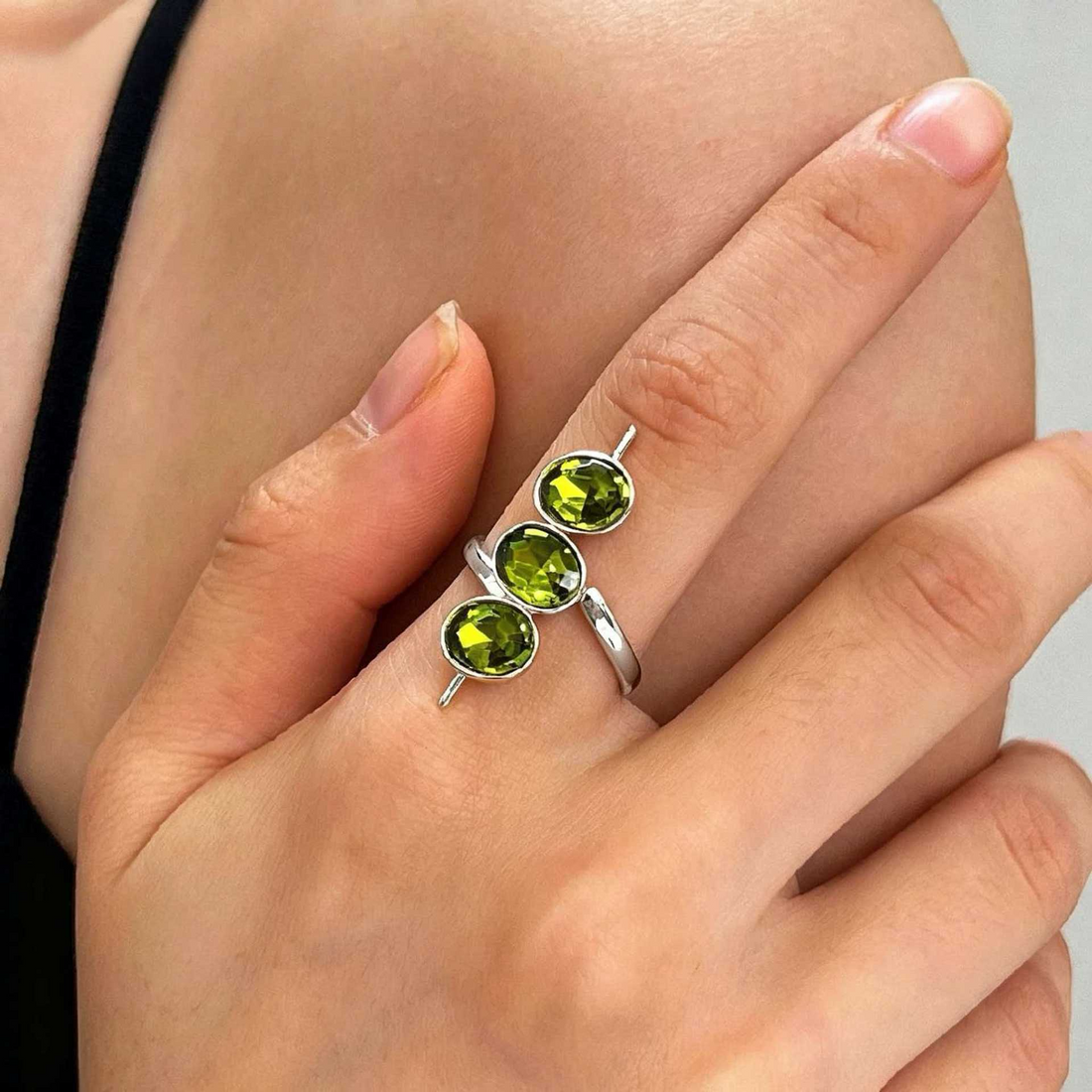 Women’s Statement Ring with Three Oval Center Stones and Linear Arrangement
