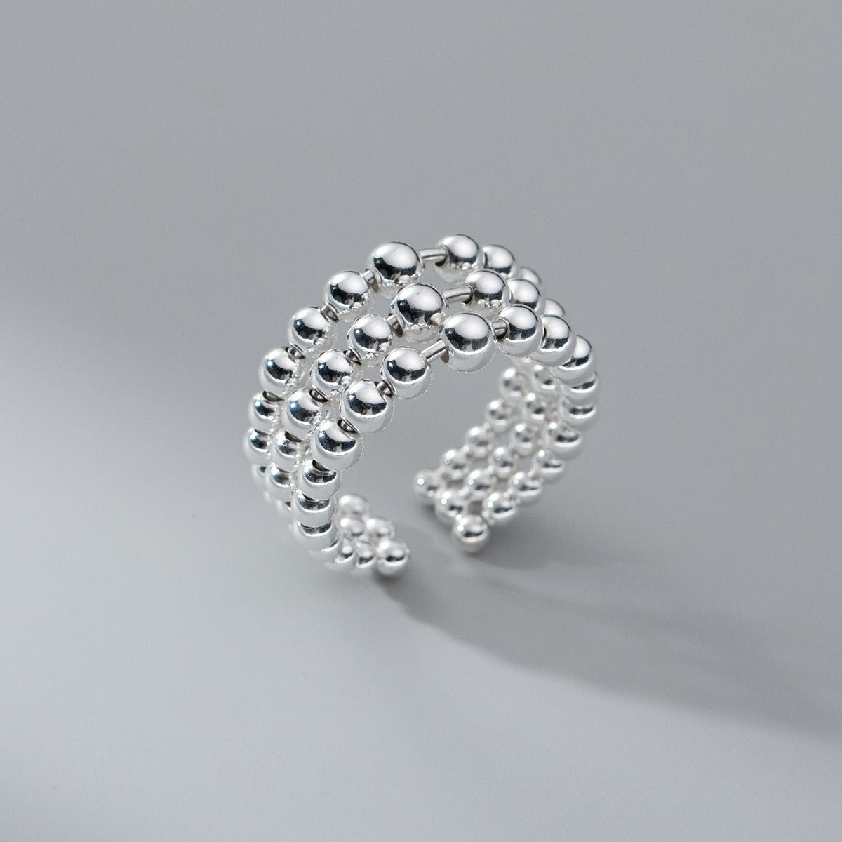 Women’s Wide Ring with Layered Pearl Details and Polished Surface
