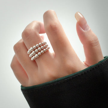 Women’s Wide Ring with Layered Pearl Details and Polished Surface