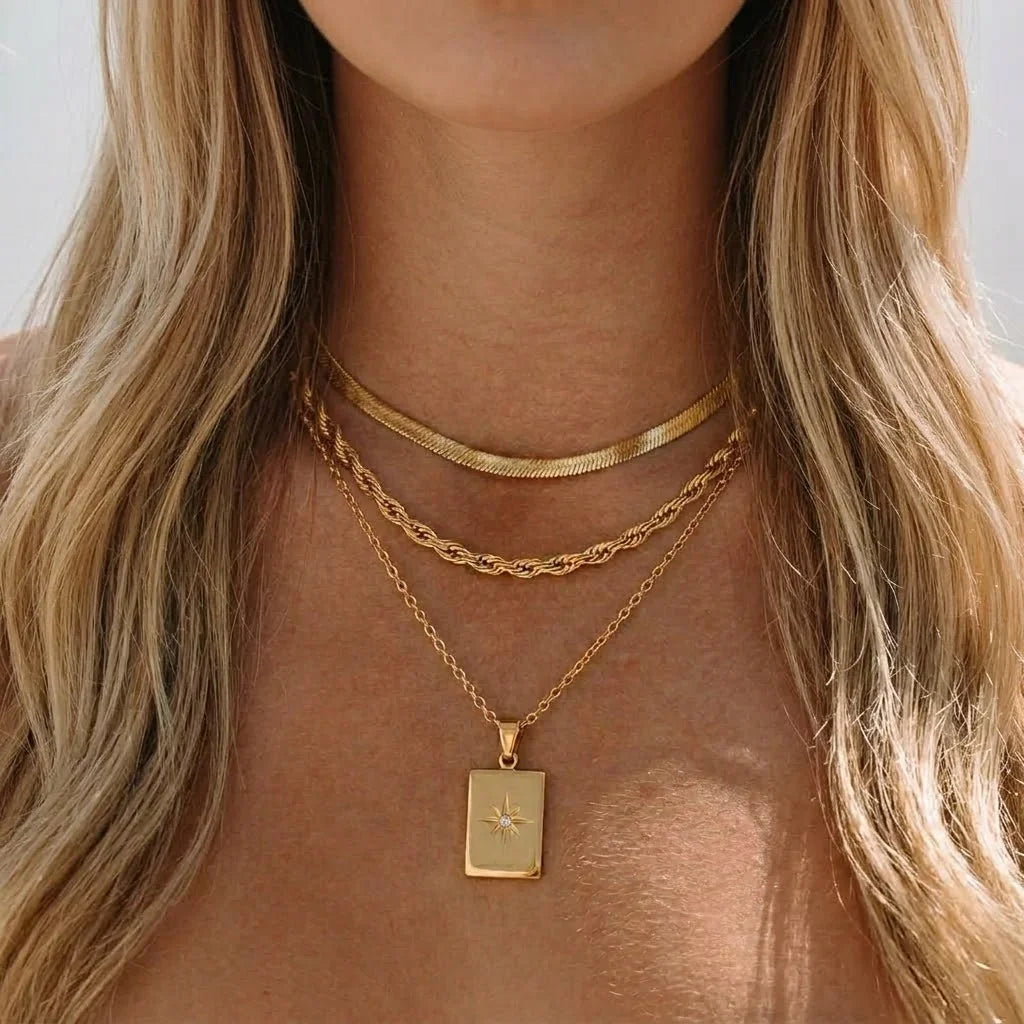 Women's Multilayered Necklace with Three Fine Chains and Stone Accents