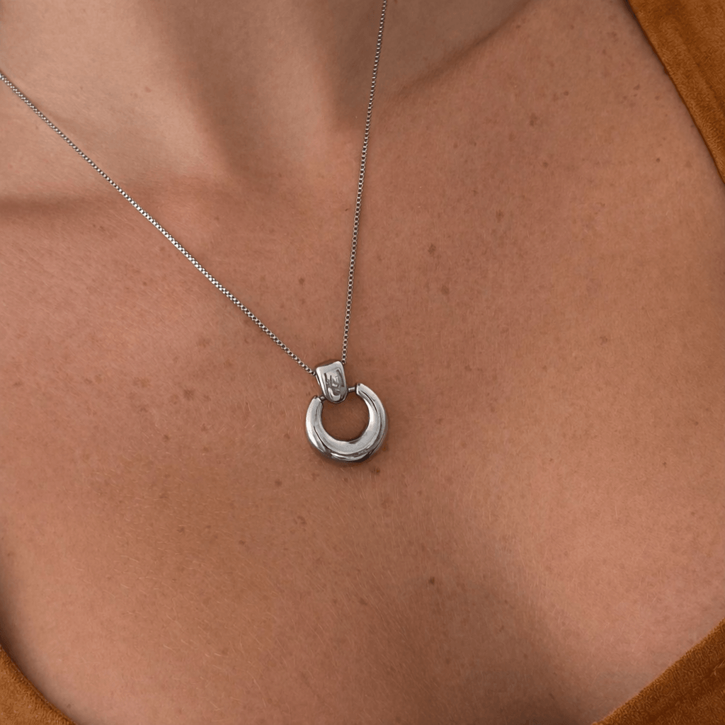Women's Pendant Necklace with Round Open Pendant and Sculptural Form