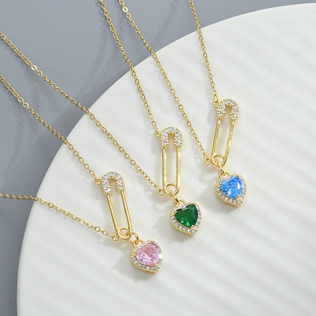 Women’s Necklace with Safety Pin Pendant and Heart Detail