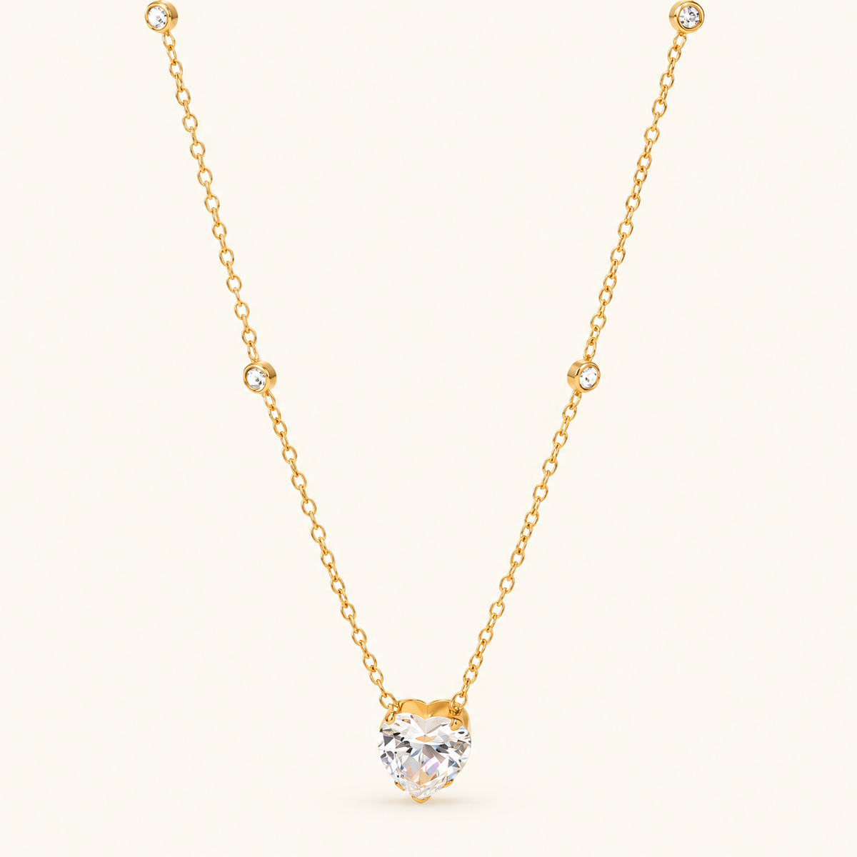 Women's Heart Pendant Necklace with Faceted Center Stone and Distributed Stone Accents