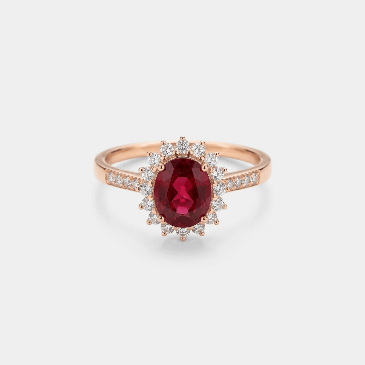 Women’s Ring with Oval Garnet Center Stone and Halo Stone Setting