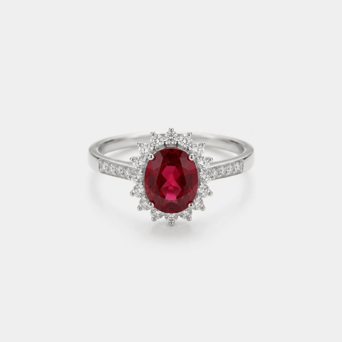 Women’s Ring with Oval Garnet Center Stone and Halo Stone Setting