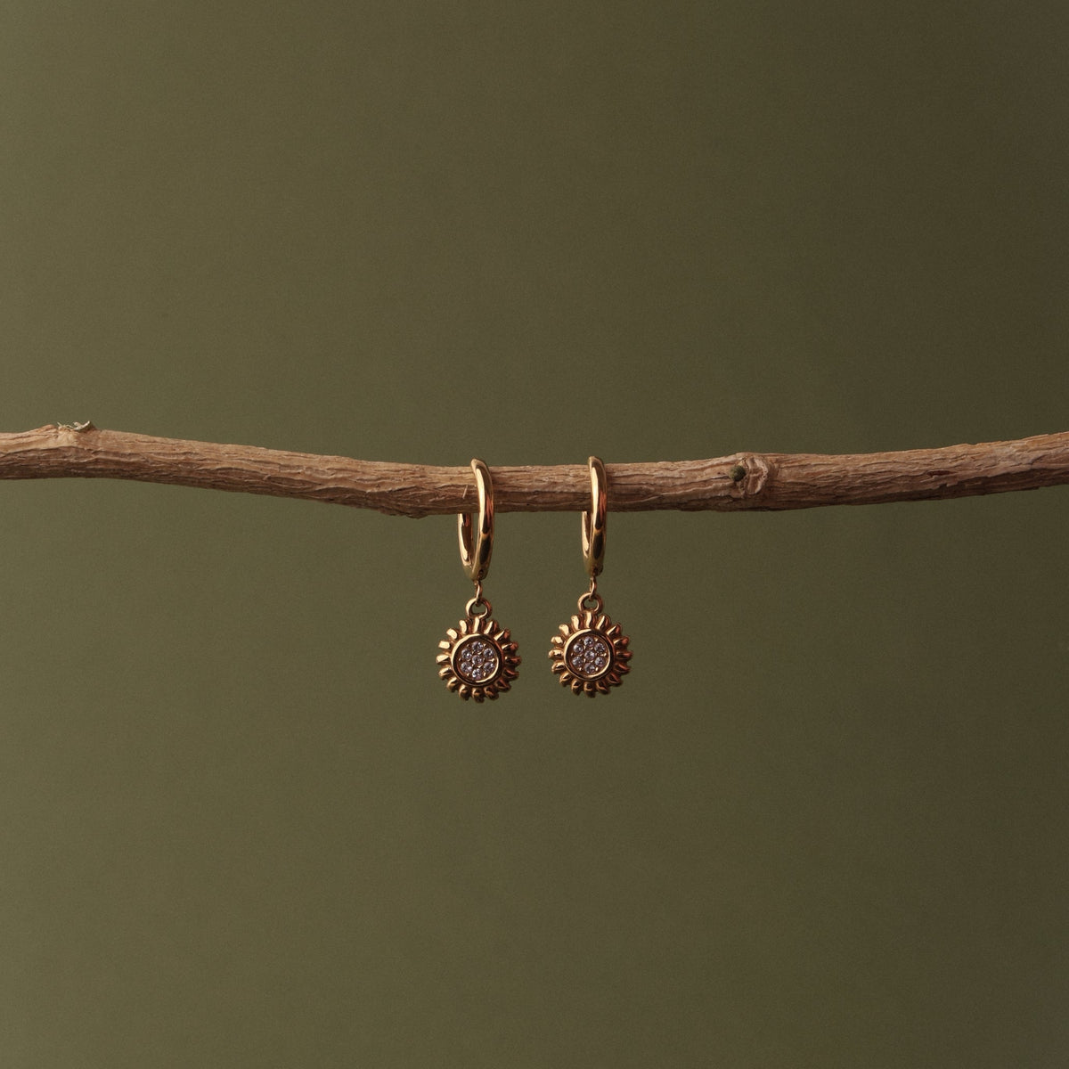 Women’s Huggie Earrings with Sun Pendant and Round Stone Setting