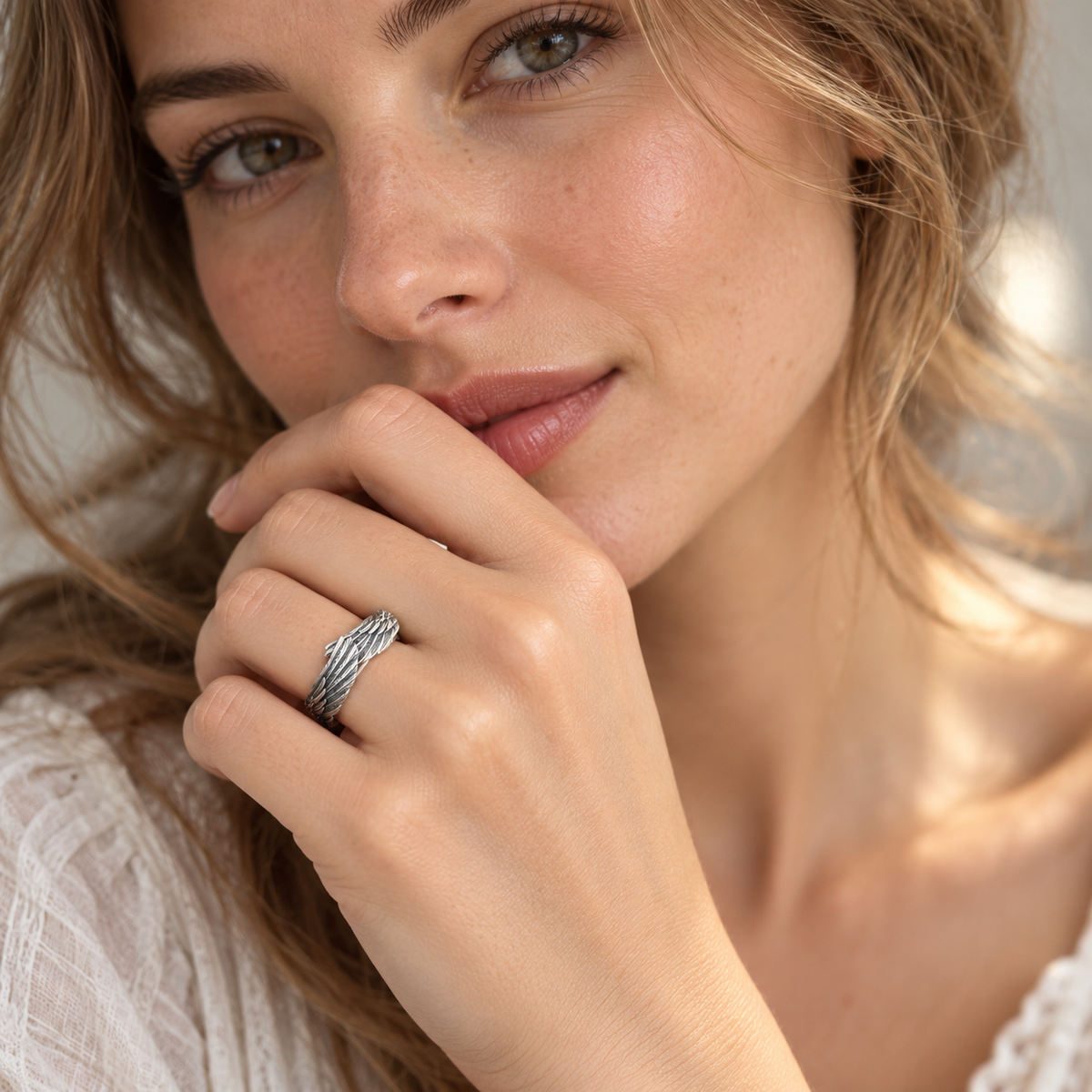 Women’s Ring with Angel Wing Design and Overlapping Wings