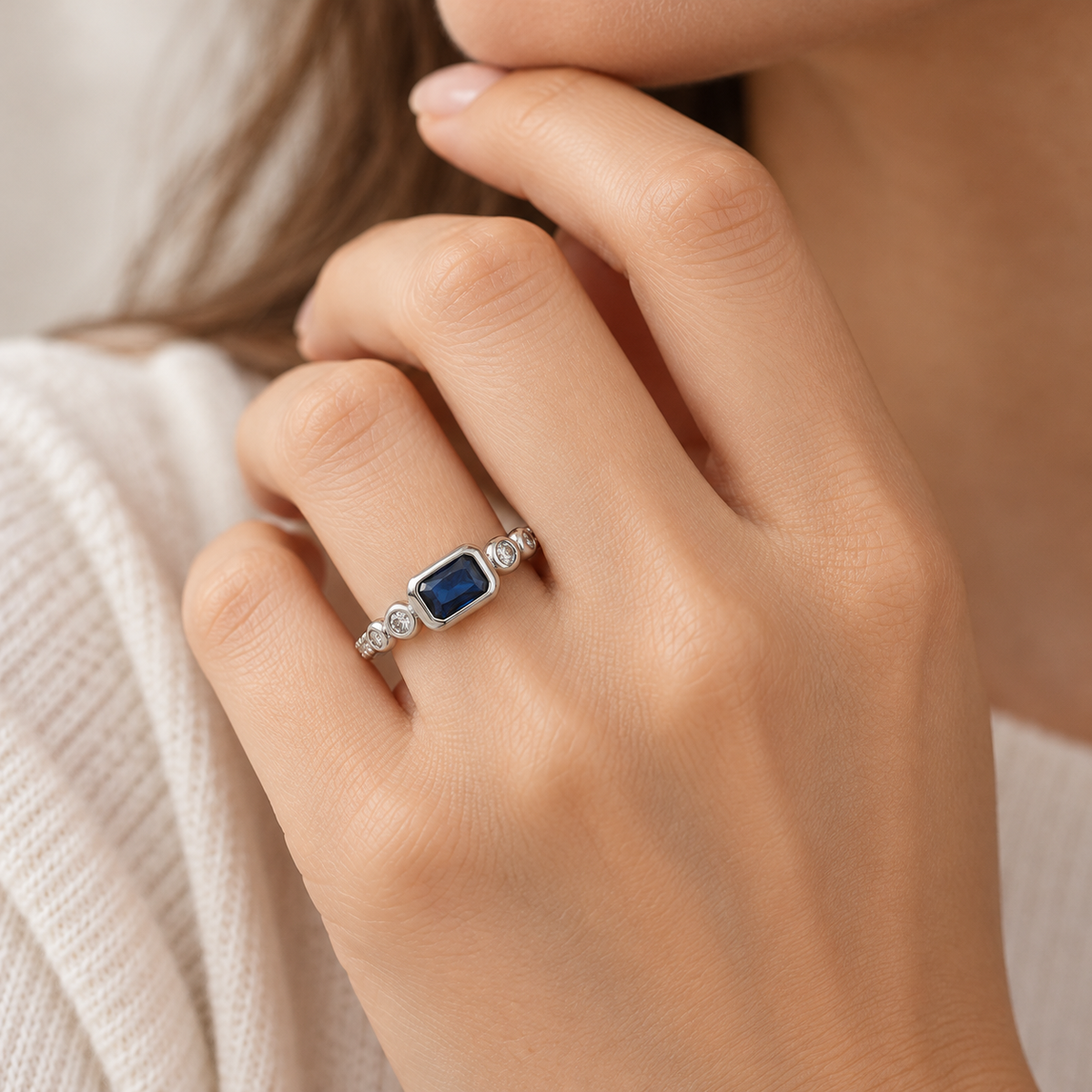 Women’s Ring with Oval Center Stone and Clear Prong Setting