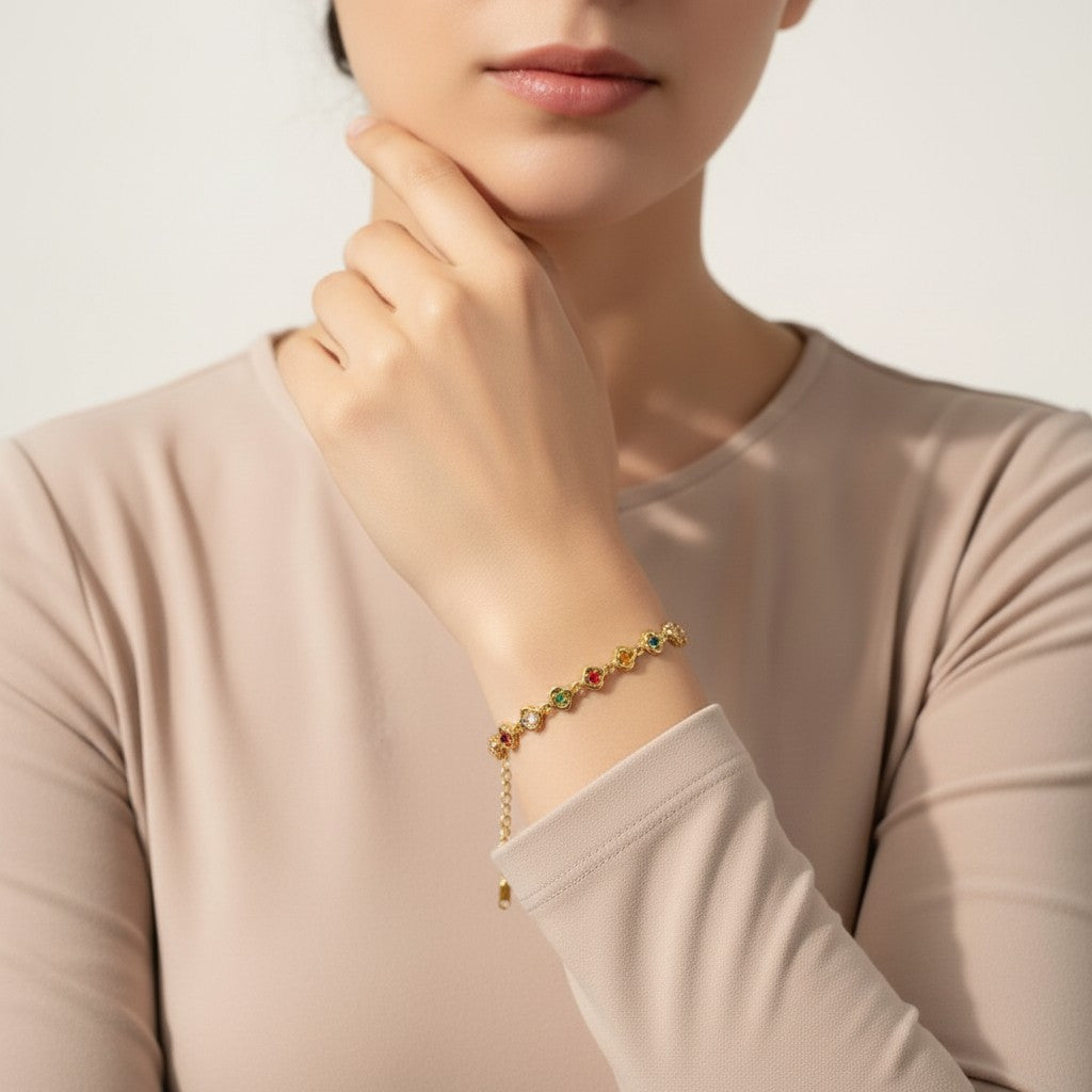 Women’s Charm Bracelet with Multiple Round Motifs and Distributed Stone Accents