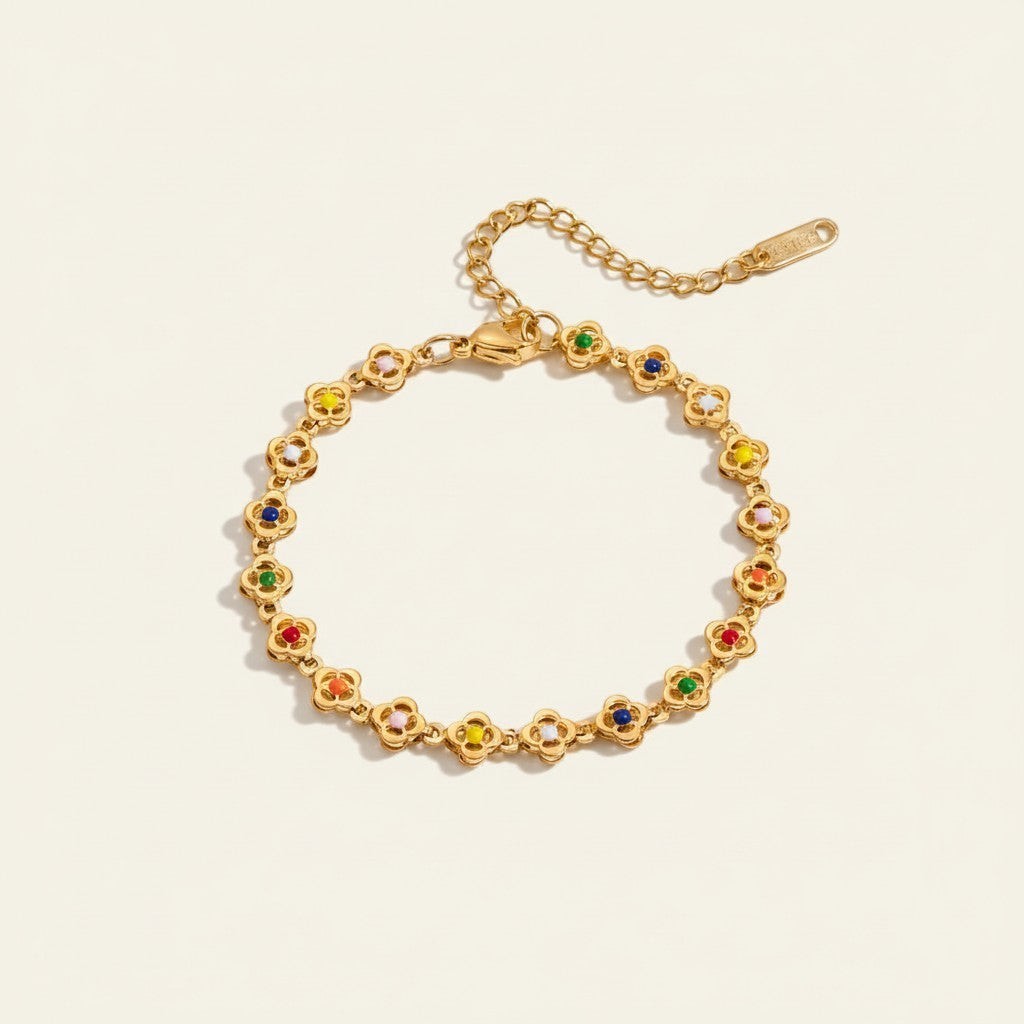 Women’s Charm Bracelet with Multiple Round Motifs and Distributed Stone Accents