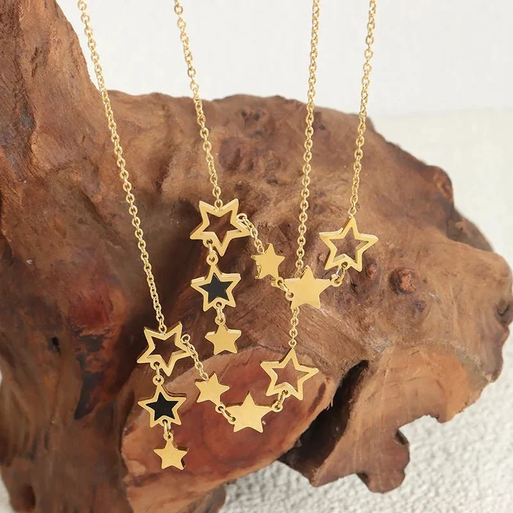 Women's Star Necklace with Multiple Charms and Asymmetrical Star Design