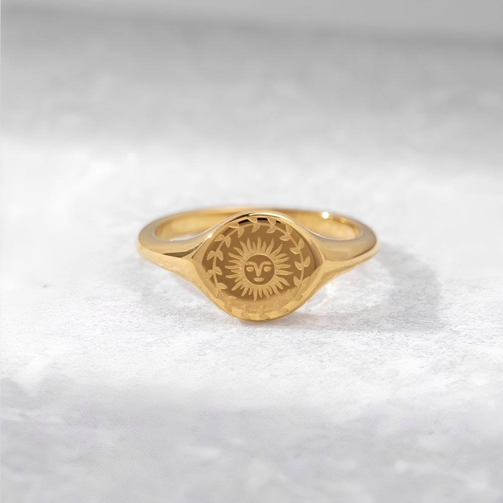 Women’s Signet Ring with Sun Motif and Floral Border Engraving