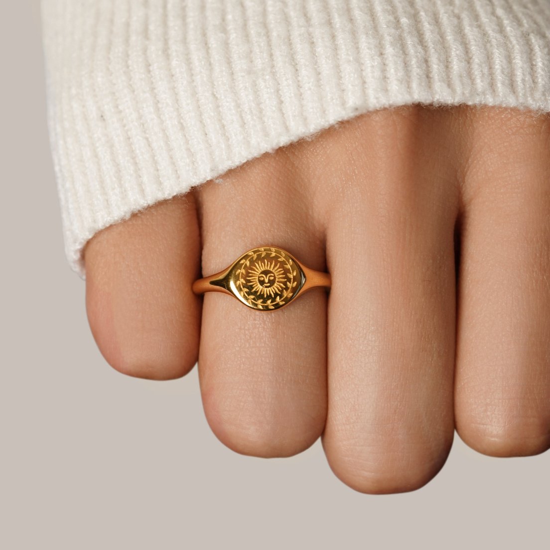 Women’s Signet Ring with Sun Motif and Floral Border Engraving