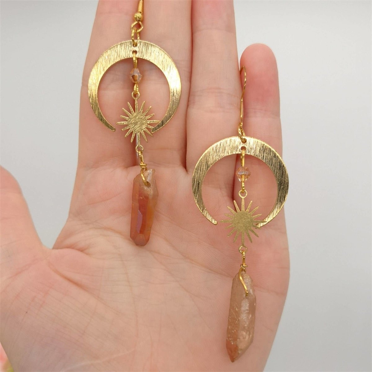 Homa - Crescent Moon Earrings made of Tangerine Quartz