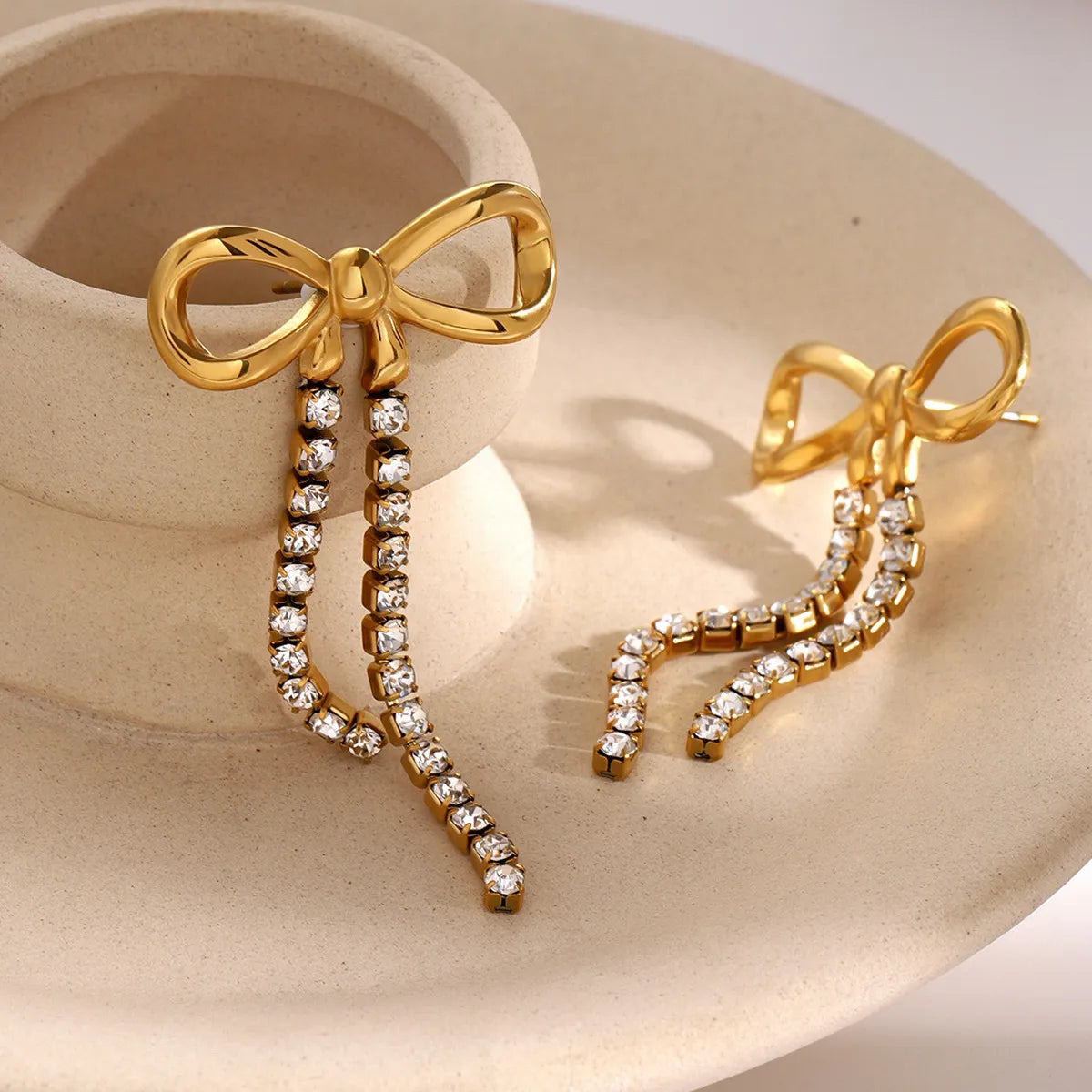 Women's Drop Earrings with Bow Motif and Double Stone Fringes