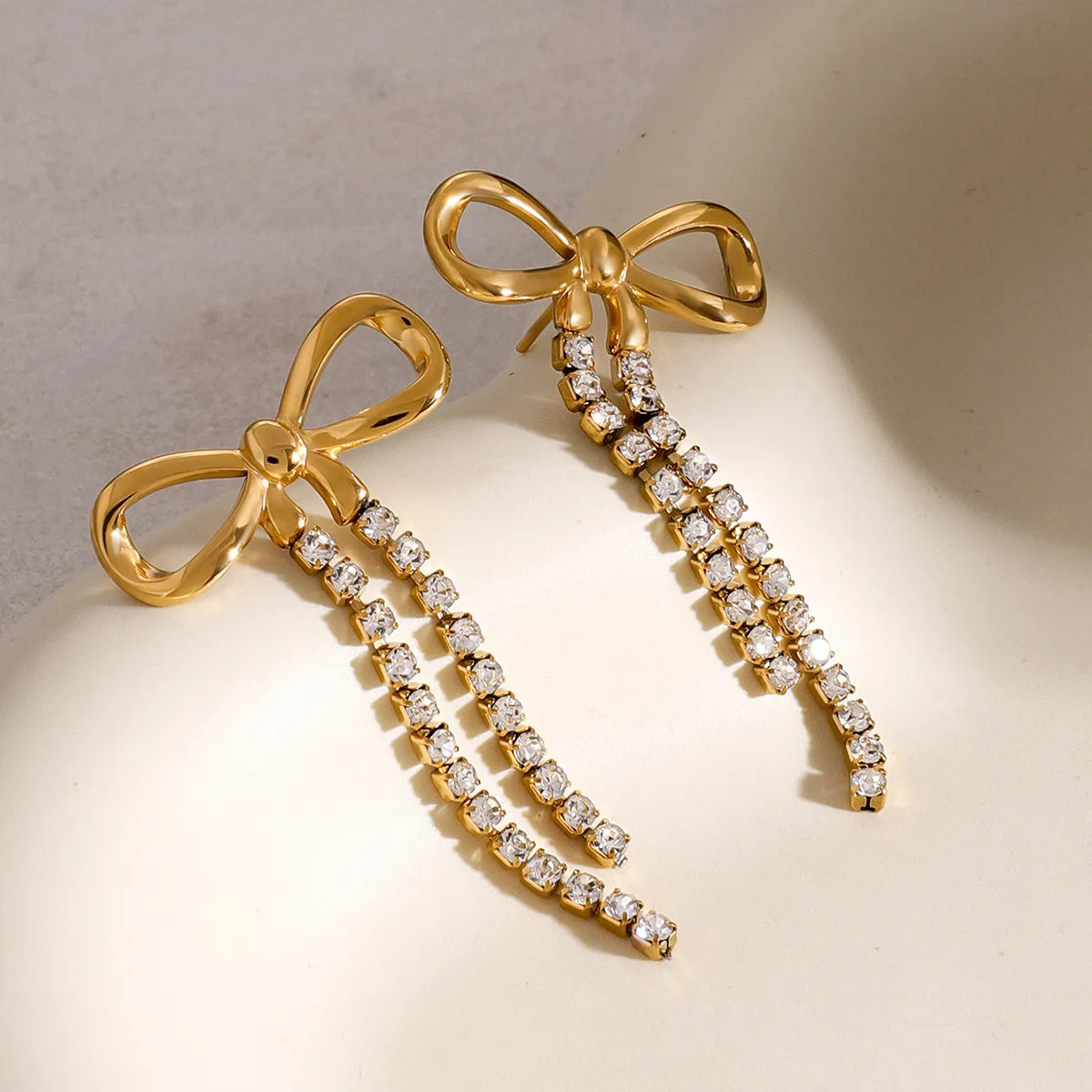 Women's Drop Earrings with Bow Motif and Double Stone Fringes